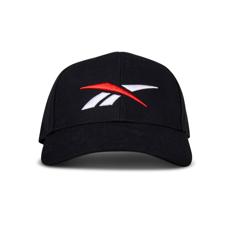 The Reebok Vector Baseball Cap in black features an embroidered red and white Reebok logo on the front, displayed against a white background.