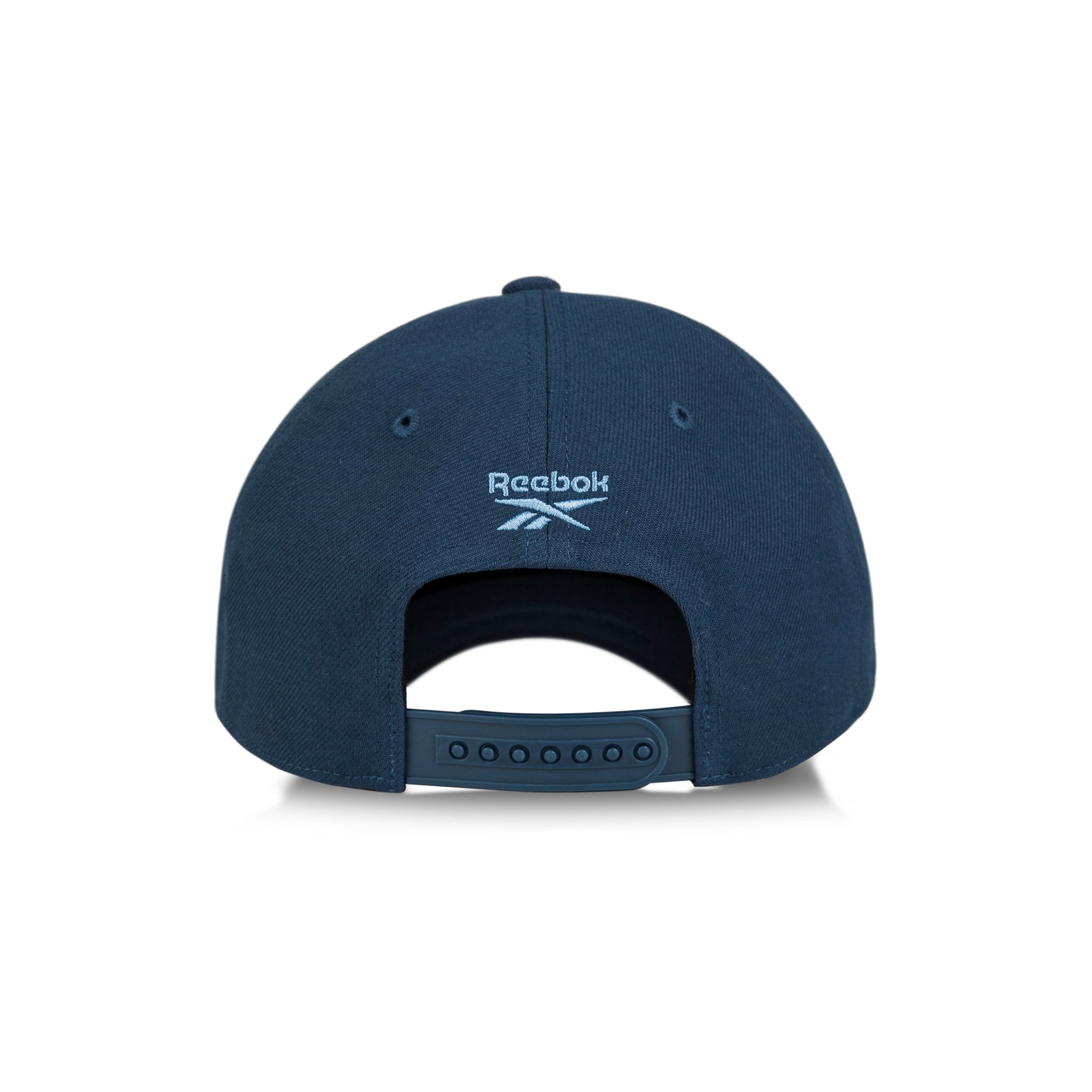 A navy Reebok Vector Baseball Cap shown from the back, with a white Reebok logo and adjustable snapback. Set against a plain white background, it highlights the cap’s sleek design and sustainable performance.