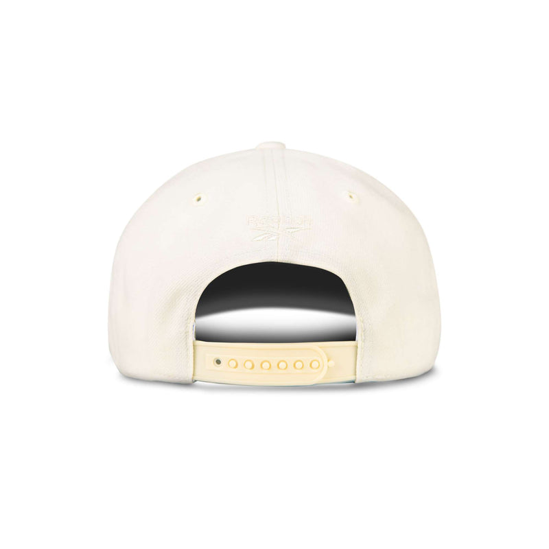 The image shows the back of the Reebok Vector Baseball Cap, featuring a plain white fabric design and an adjustable snapback closure, photographed against a white background.