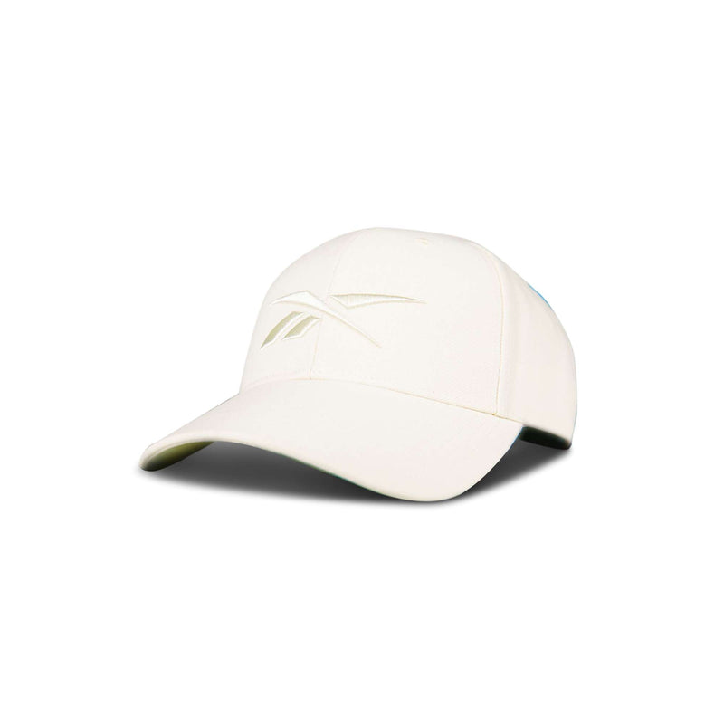The Reebok Vector Baseball Cap, in white, showcases a subtle embossed logo on the front and is displayed against a plain white background.