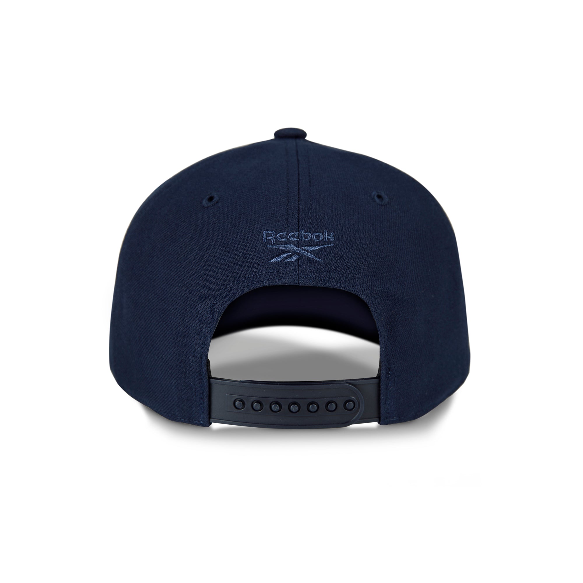 A navy blue Reebok Vector Baseball Cap shown from the back, with an adjustable snapback strap and the Reebok logo above the opening—crafted for sustainable performance and comfort.