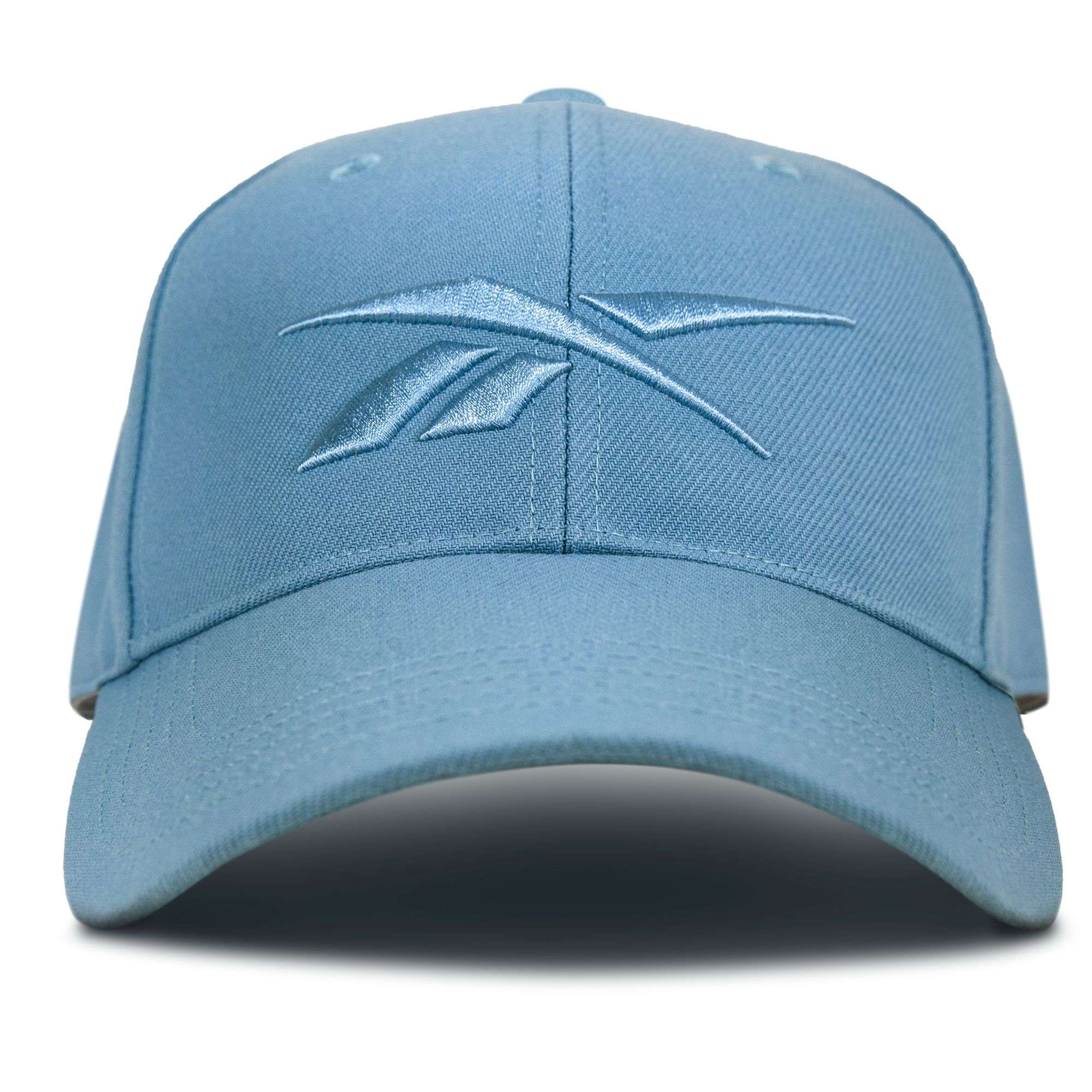 The Reebok Vector Baseball Cap in light blue features an embroidered front logo and adjustable snapback closure, shown from the front on a white background.