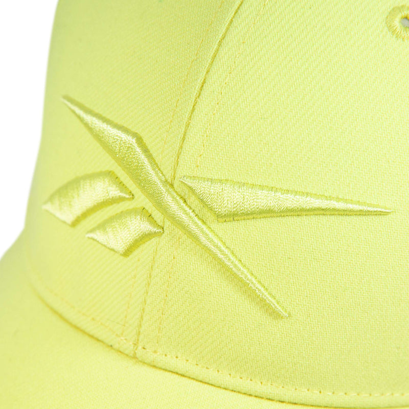 Close-up of the Reebok Vector Baseball Cap in yellow, featuring an embroidered logo on the front panel, detailed stitching, fabric texture, and a comfortable adjustable snapback closure.
