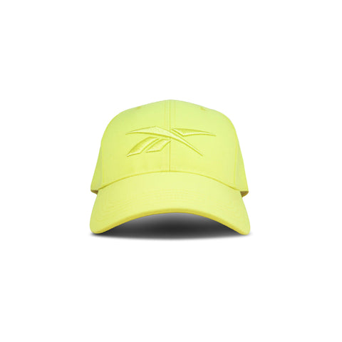 A vibrant yellow Reebok Vector Baseball Cap with a front logo embroidery and adjustable snapback is shown against a plain white backdrop.