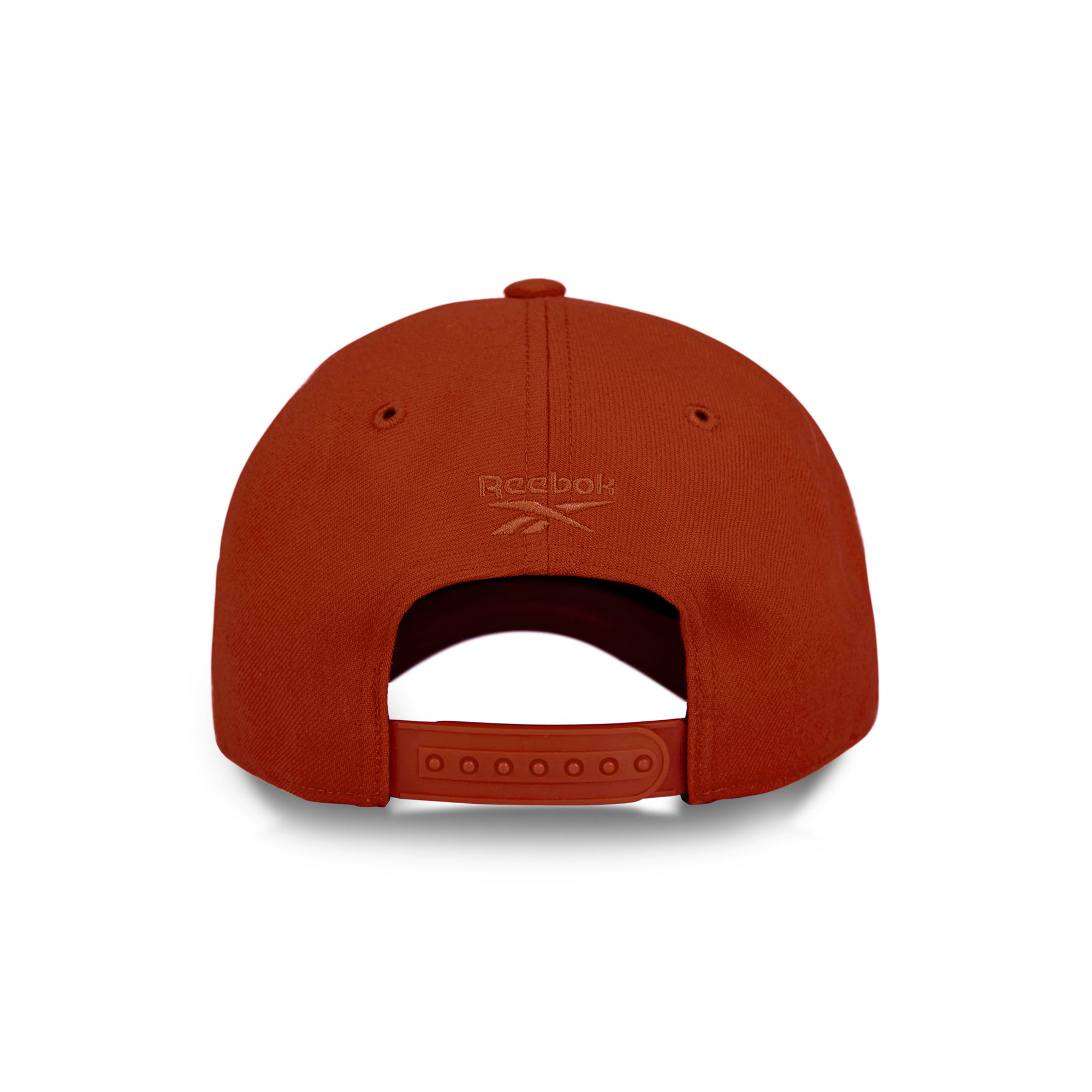 Back view of a red Reebok Vector Baseball Cap with an adjustable snapback closure and embroidered logo above the opening, shown on a white background.