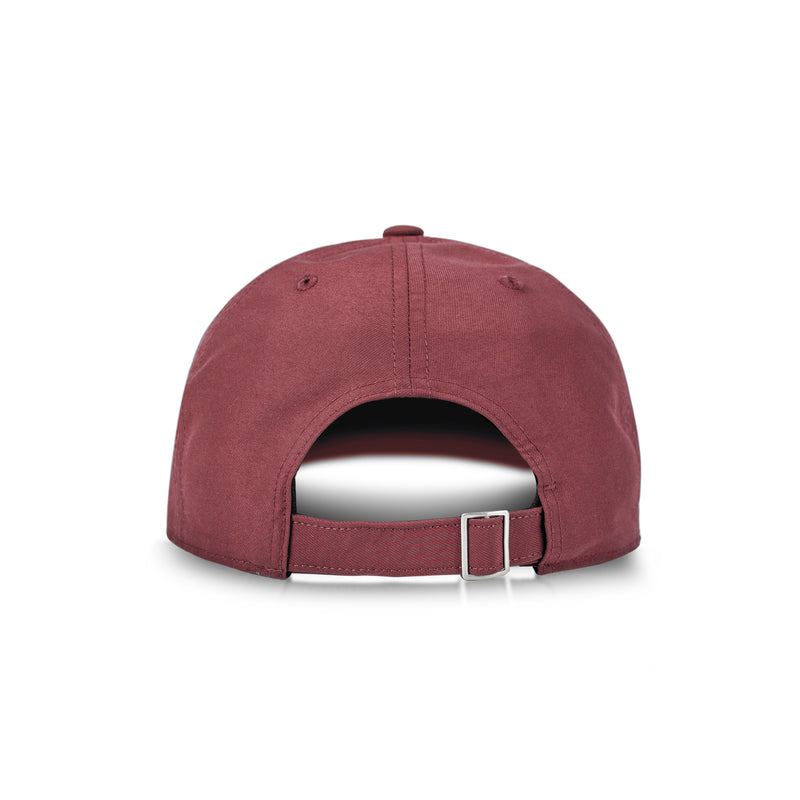 The Reebok Logo Cap in maroon cotton twill is shown from the back, highlighting its adjustable strap with a metal buckle and an opening above the closure.