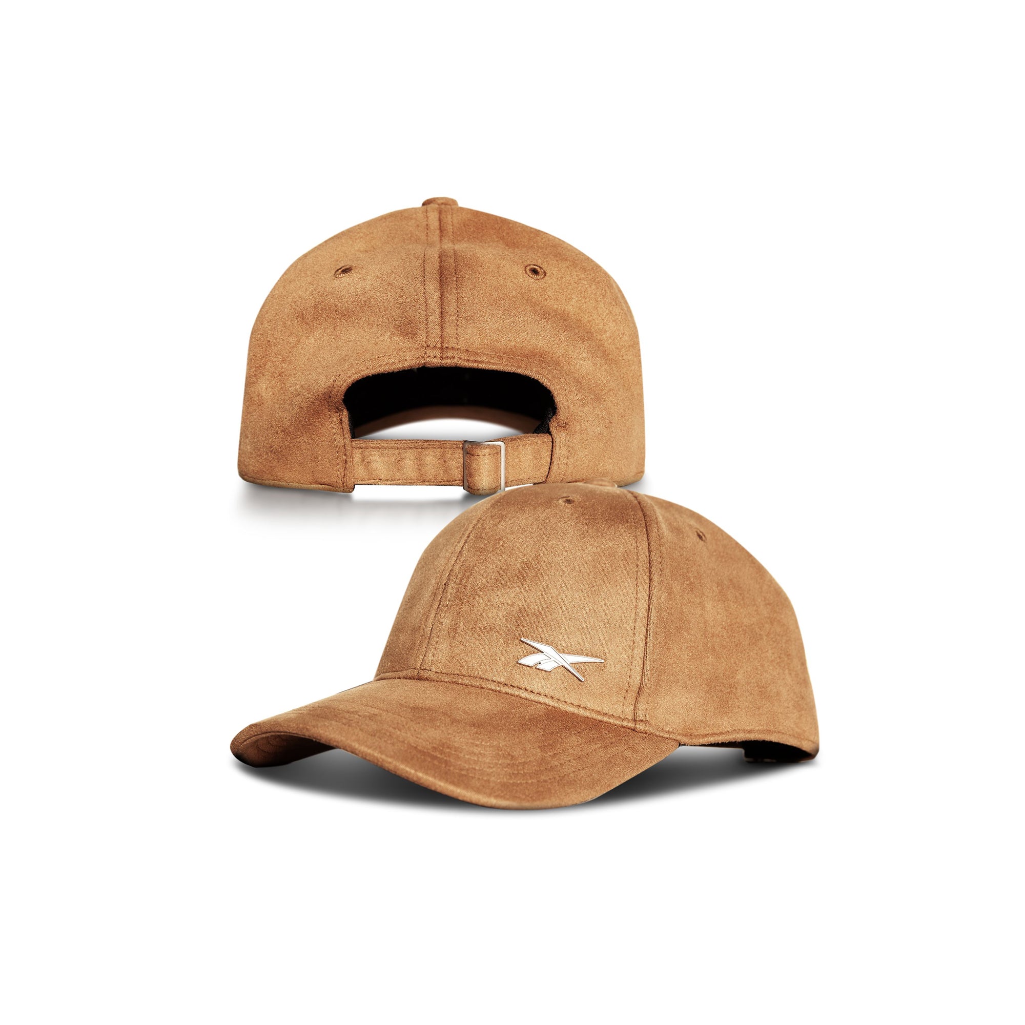 The Suede Badge Cap by Reebok features a white embroidered logo on the front left panel and an adjustable strap with a metal buckle at the back. Made from premium vegan suede, it offers both style and comfort.