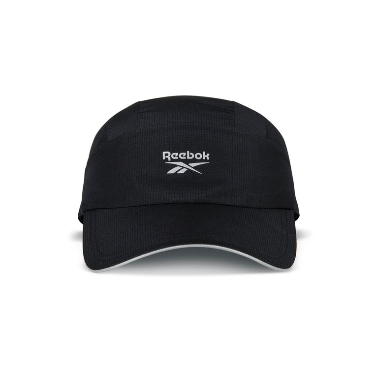 The front of the black Reebok Running Cap features the white Reebok logo and brand name on its panel, plus a slightly curved brim. This lightweight hat offers both comfort and style.