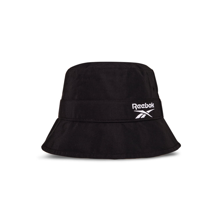 The Reebok Bucket Hat features a wide brim and an embroidered white Reebok logo on the front. Displayed against a plain white background.