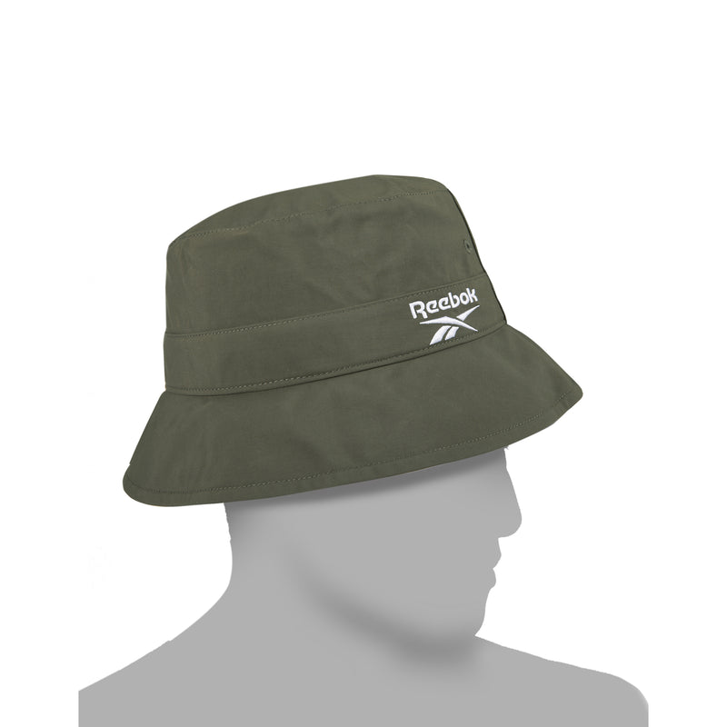 A mannequin wears a Reebok Bucket Hat in olive green, made from recycled nylon with a white embroidered logo on the front. The plain white background highlights this eco-friendly streetwear accessory.