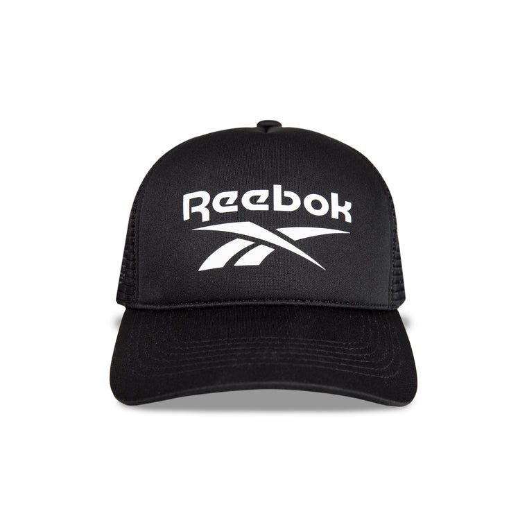 The Reebok Aero Cap in black features a white Reebok logo and text on the front. This moisture-wicking athletic hat combines classic style with performance and is shown from the front against a white background.