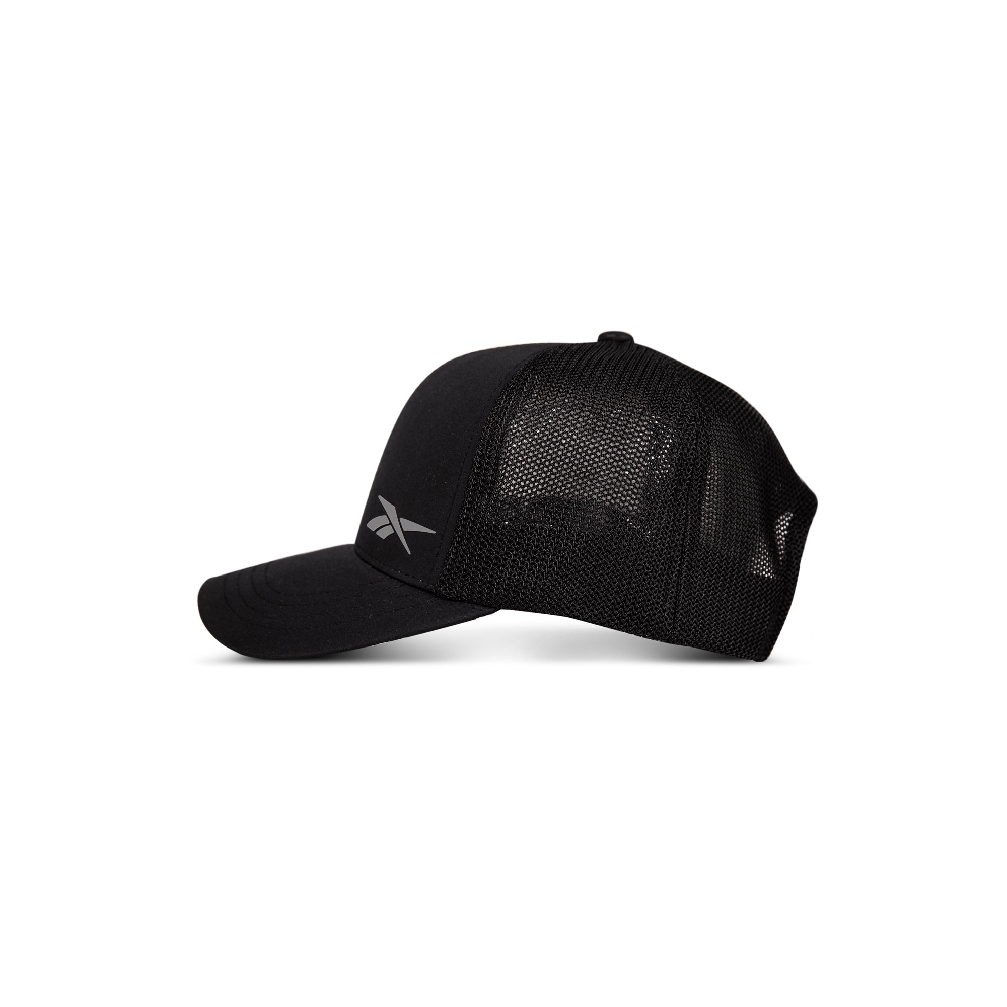 The Reebok Athletic Cap features black mesh, a curved brim, and a subtle side logo. Made from recycled polyester for comfort and performance. Shown in profile on a plain white background.