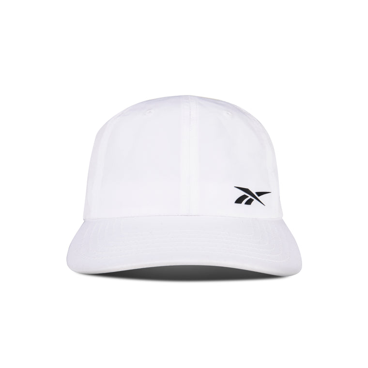 The Reebok Flow Cap is a plain white cap made from recycled polyester, featuring a small black logo on the front left and a moisture-wicking sweatband, shown against a white background.