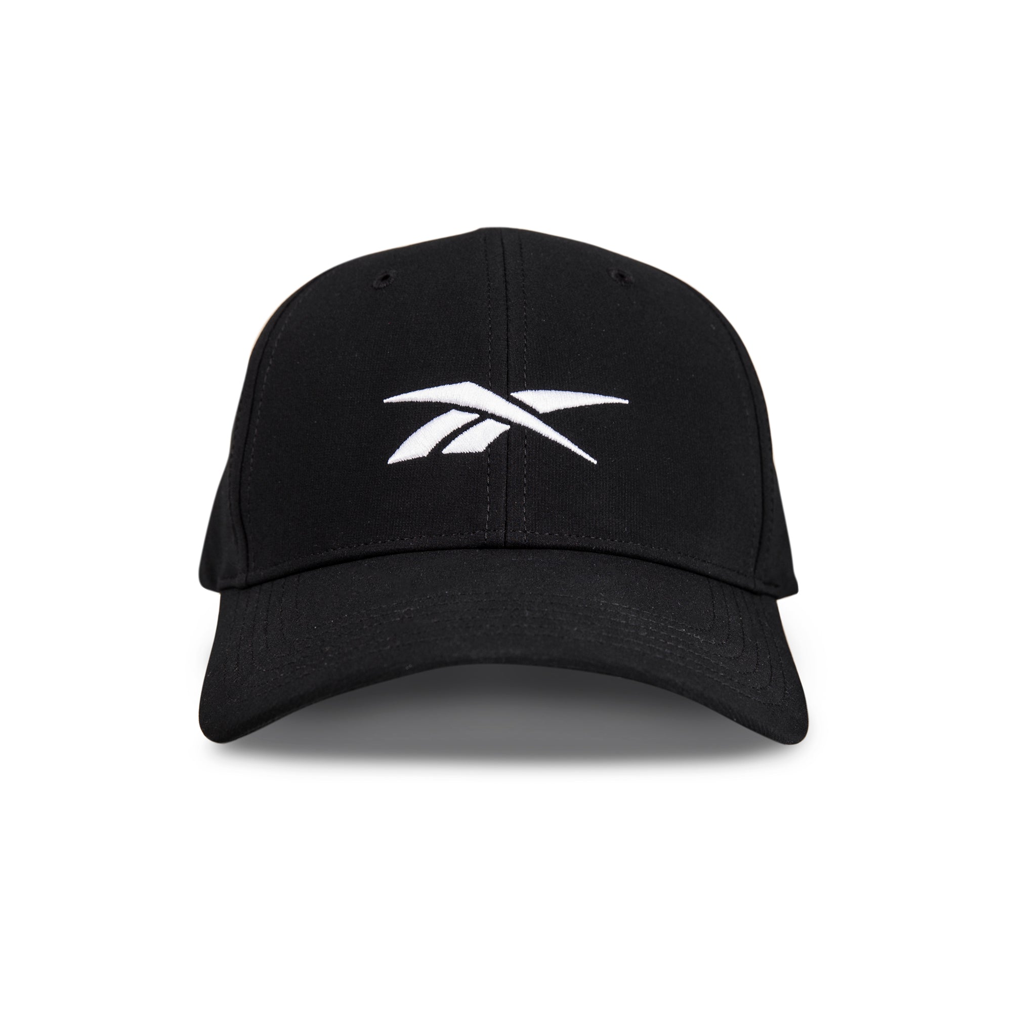 The Reebok Range Cap is a black baseball cap with a curved brim and a white Reebok logo on the front, shown from the front on a plain white background.