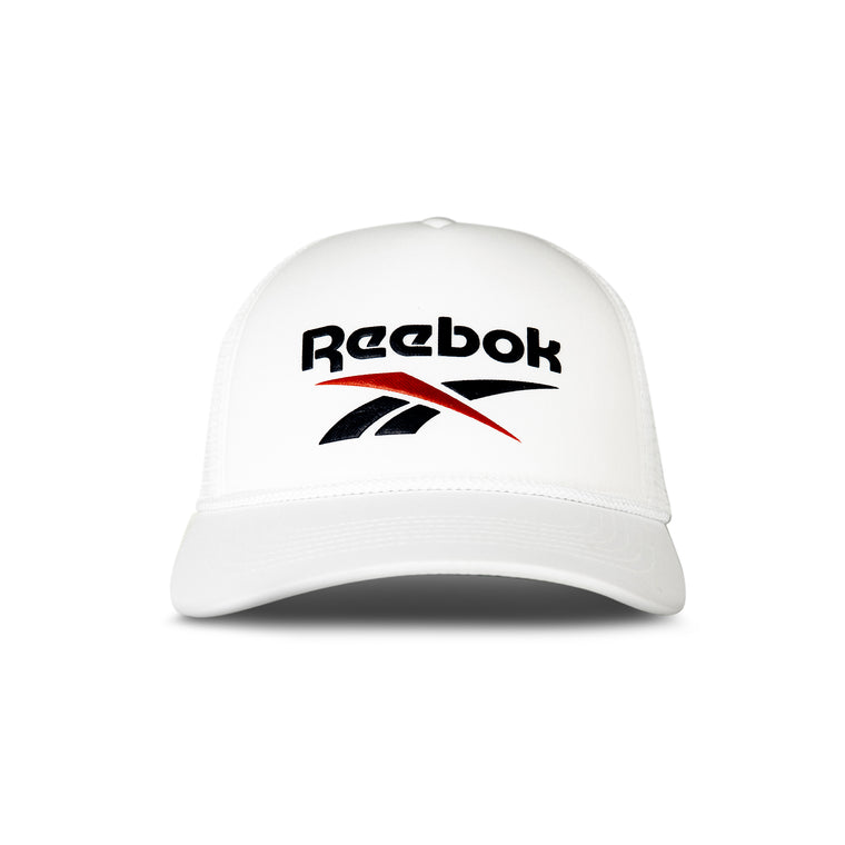 The Reebok Deluxe Aero Cap is a white mesh hat with the black and red Reebok logo on the front, featuring a moisture-wicking sweatband for all-day comfort.