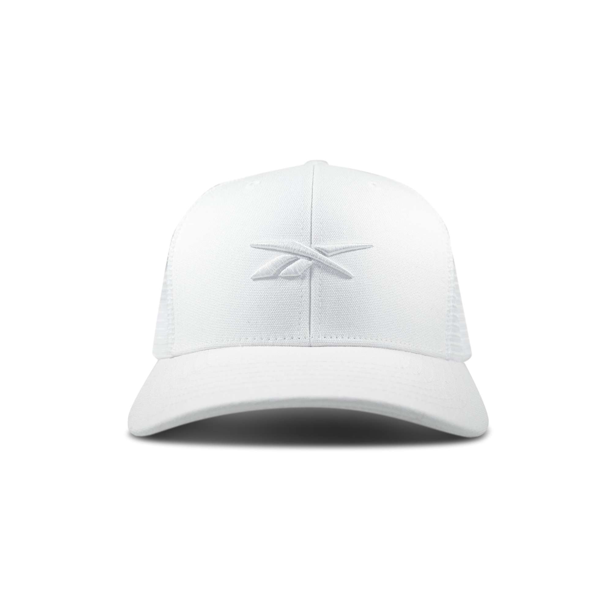 The Reebok Embroidered Vector Trucker Cap is a white baseball cap with a curved brim and a subtle embroidered logo on the front center, shown against a plain white background.