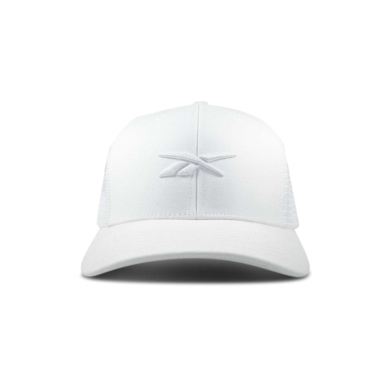 The Reebok Embroidered Vector Trucker Cap is a white baseball cap with a curved brim and a subtle embroidered logo on the front center, shown against a plain white background.