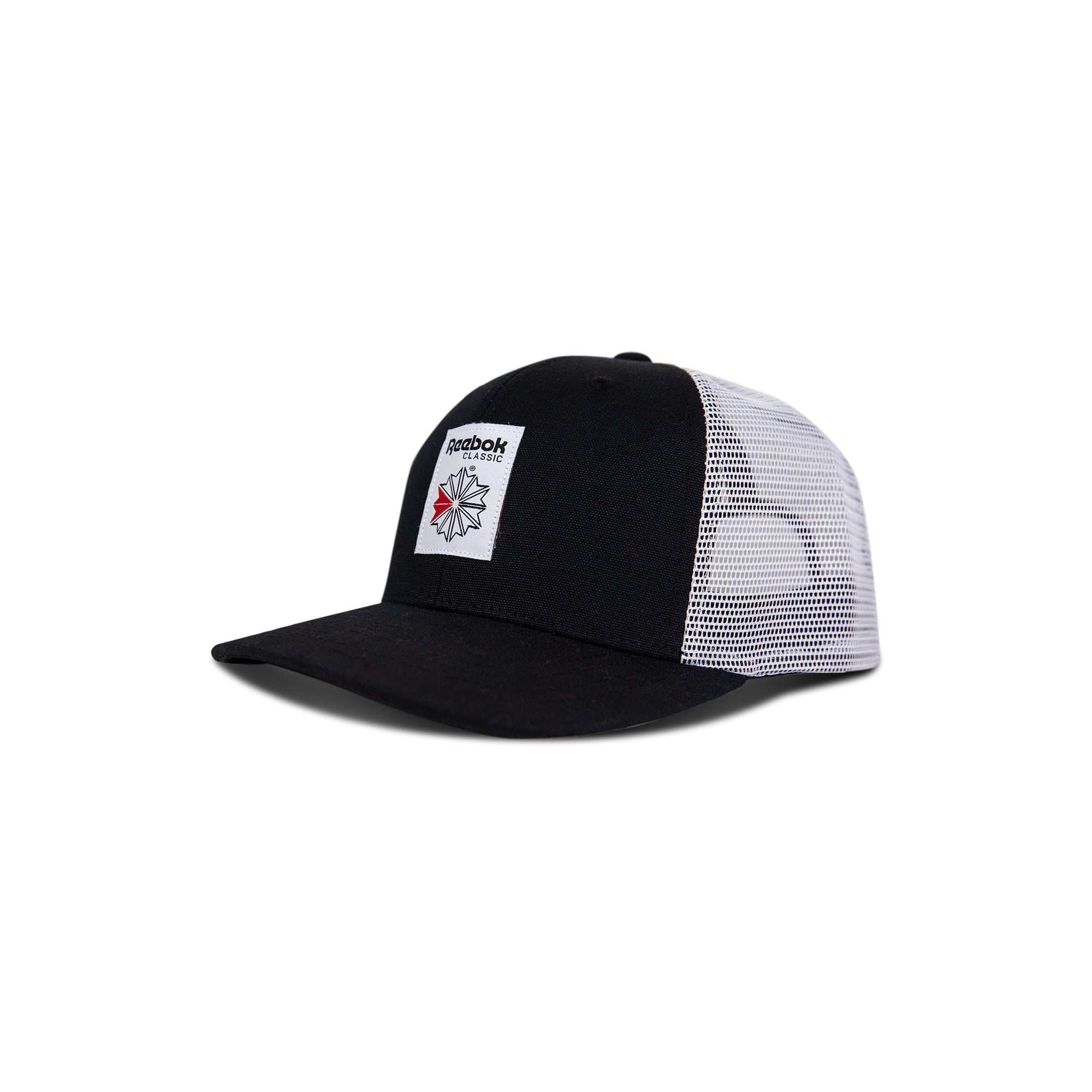 The Reebok Woven Patch Vector Trucker Cap features a solid black front with a woven patch logo and white mesh back panels. This flat-brim cap has an adjustable snapback for a perfect fit.