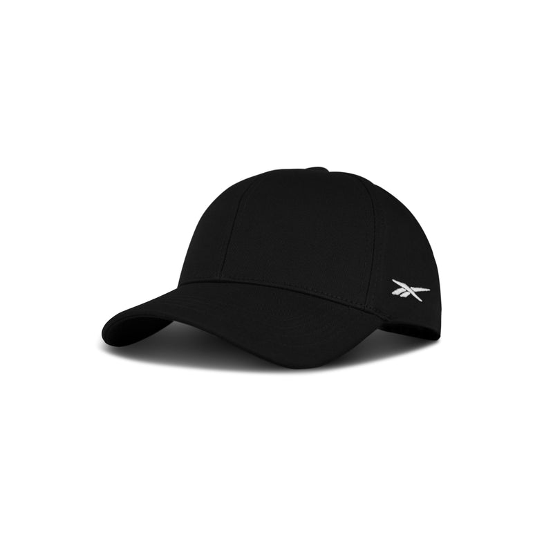 The Reebok Chroma Cap is a black cotton twill baseball hat with an adjustable snapback and a small white Reebok logo on the left, shown on a white background.