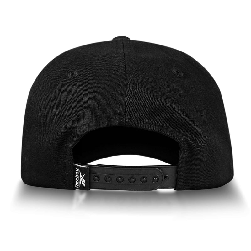 Back view of the Reebok Logo S-Vector Cap, a cotton twill hat with an adjustable snapback and a small Reebok logo tag on the left side.