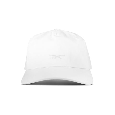 The Reebok Logo S-Vector Cap is a white cotton twill snapback with an embroidered logo on the front, shown from a front-facing view against a white background.
