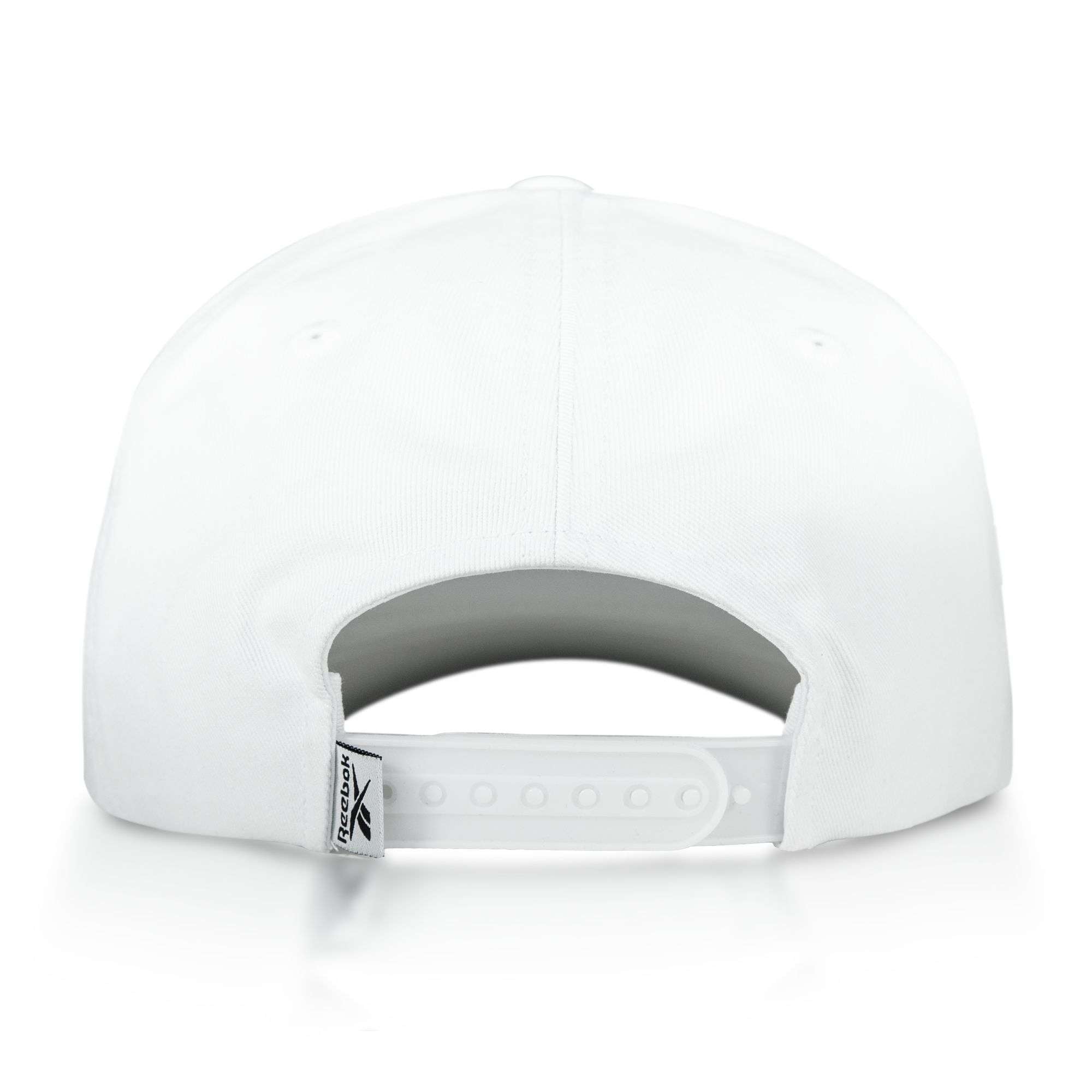 The image displays the back of the Reebok Logo S-Vector Cap—a plain white cotton twill hat with an adjustable snapback closure and a small white tag on the left side, blending comfort and classic style.