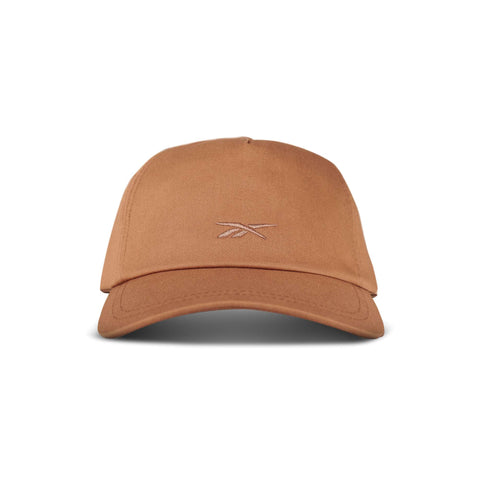 The Reebok Logo S-Reebok Vector Cap is a brown baseball cap with a curved brim and an embroidered Reebok logo on the front, shown facing forward against a white background.