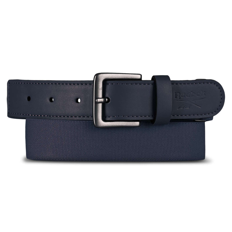 The Reebok Youth Baseball Belt is a navy blue leather stretch elastic belt with a dark metal buckle, shown rolled up and featuring the Reebok brand name embossed on the strap's end.
