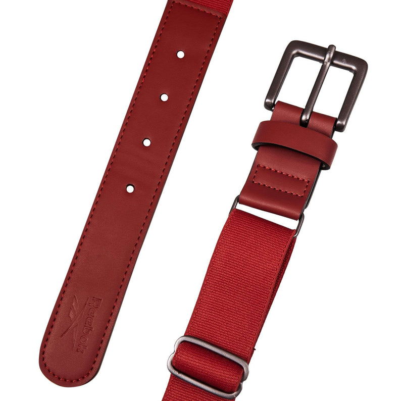 A close-up of the Reebok Youth Baseball Belt with a silver buckle, multiple adjustment holes, stretch elastic fabric, and an embossed logo for style and durability.