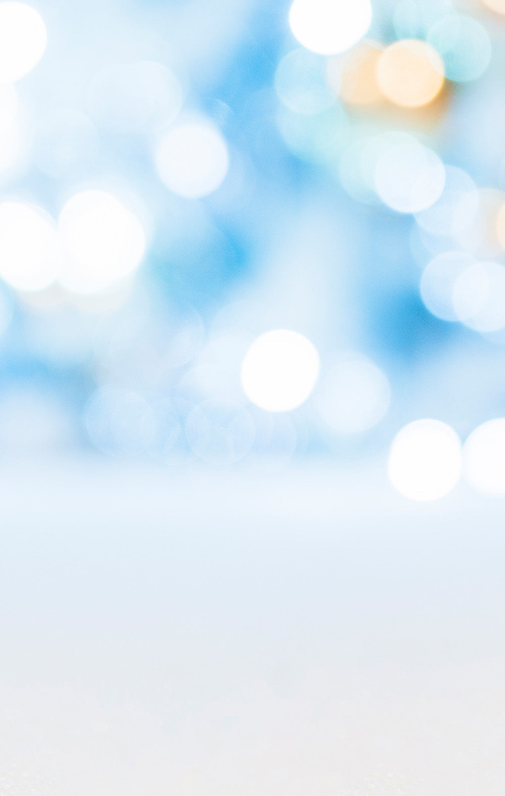 Blurred bokeh effect with light blue and white colors