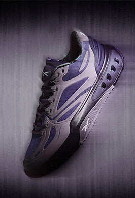 Purple and gray sneaker on a dark textured background