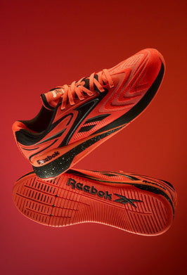 Red Reebok sneaker on a red background