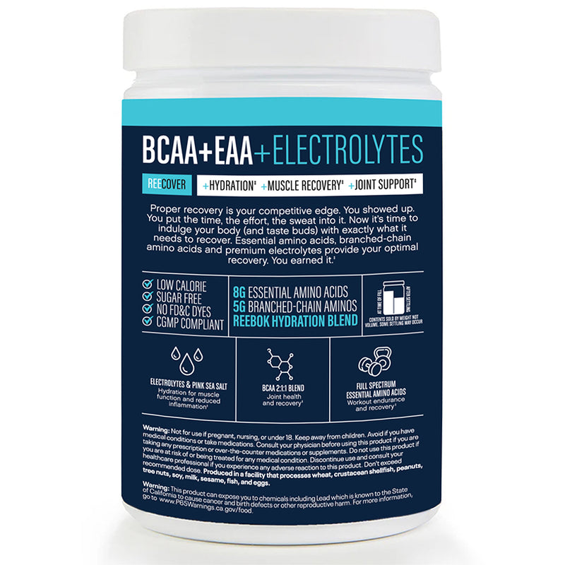 A white Reebok ReeCover BCAA + EAA + Electrolytes container features blue and black accents, highlighting hydration and muscle recovery benefits with detailed info on amino acids and electrolytes on the front.