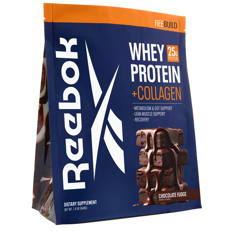 A stand-up pouch of Reebok ReeBuild Whey Protein + Collagen in chocolate fudge, featuring an image of a stack of chocolate brownies topped with syrup to support muscle recovery.