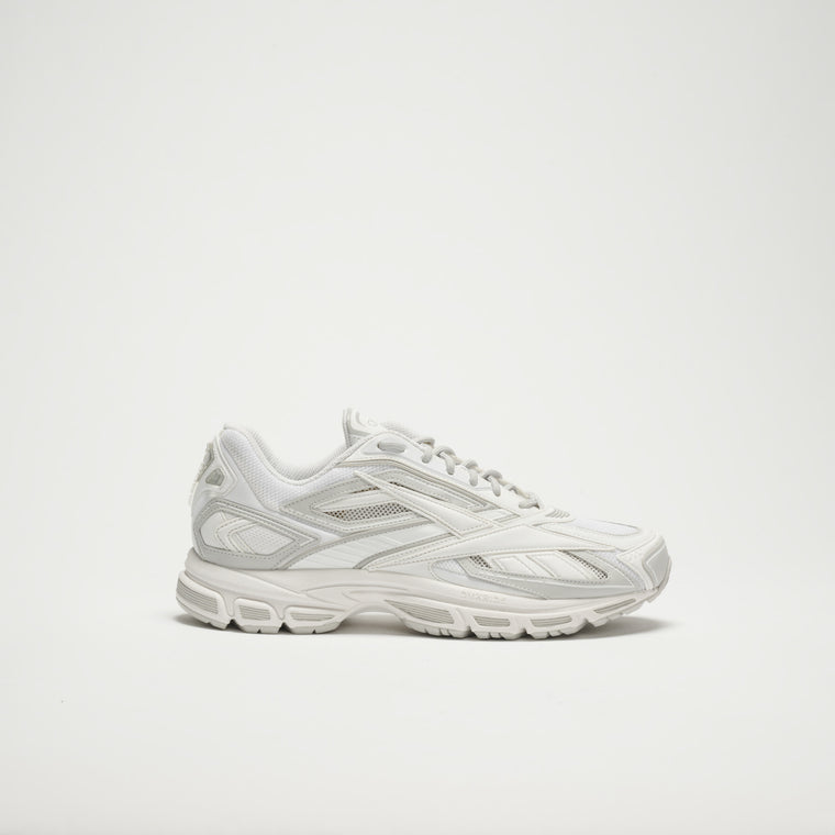 The Reebok Premier Road Ultra LTD Shoes are white running sneakers with mesh and synthetic overlays, shown in a side view on a plain white background.