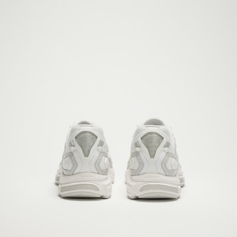 A pair of Reebok Premier Road Ultra LTD Shoes in white, shown from the back against a plain background. Silver and grey accents highlight the heel and sole, while a dual-density midsole offers enhanced comfort.