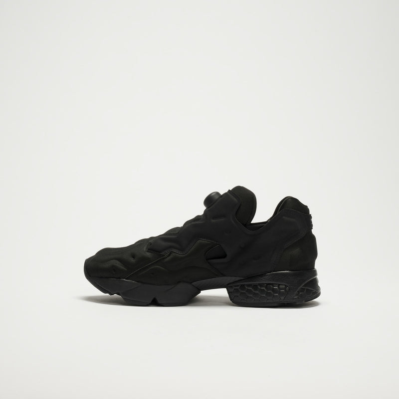 The Reebok Instapump Sliver LTD Shoes are black athletic sneakers with a chunky, futuristic design, textured sole, and air pump system, shown in profile against a plain white background.
