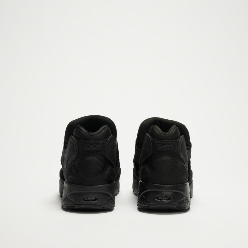 A pair of Reebok Instapump Sliver LTD Shoes in black, shown from the back and positioned side by side on a plain white background.