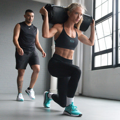 Woman doing a Hyrox exercise