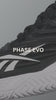 black and white tennis sneaker with zooms and detailed descriptions 