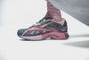 People wearing Reebok LTD shoes on white background