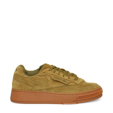 The Reebok Club C LTD Shoes feature tan suede uppers, tonal laces, subtle side branding, stitched detailing, and a light brown textured rubber sole for grip—a timeless lifestyle classic.