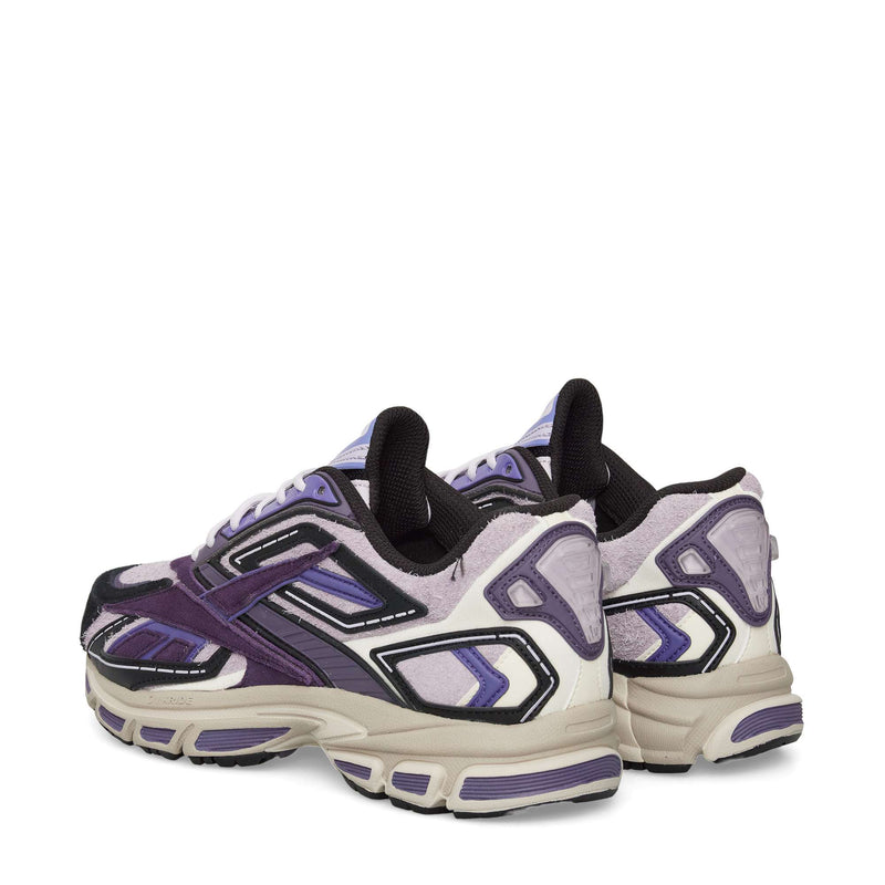 A pair of Reebok Premier Road Ultra Shoes in purple, black, and white with thick dual-density midsoles, displayed from the back and side on a white background.