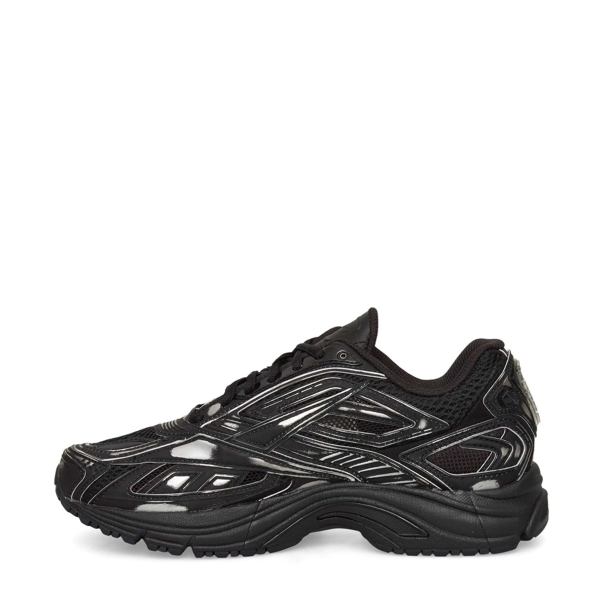 The Reebok Premier Road Ultra Shoes feature a black, glossy finish with geometric side patterns and a dual-density midsole for comfort—displayed in profile against a white background.