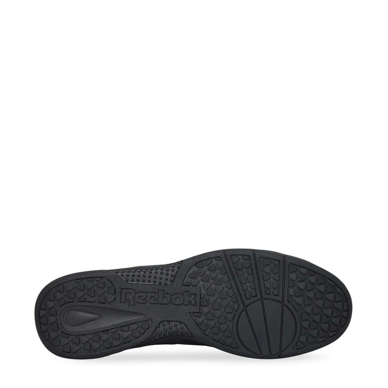 The image displays the black durable rubber sole of Reebok Hammer Pro LTD Shoes from below, highlighting textured patterns and the word "Reebok" embossed near the arch.