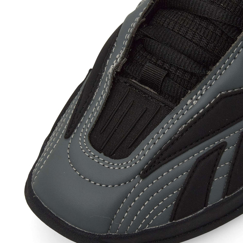 Close-up of the toe area of Reebok Hammer Pro LTD Shoes, showcasing gray and black faux leather panels, white stitching, and black mesh near the laces for a modern, sporty look.