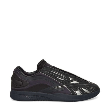 A black Reebok Hammer Pro LTD Shoe with a glossy, textured faux leather upper, mesh and synthetic overlays, and a durable rubber sole, shown in side profile on a white background.