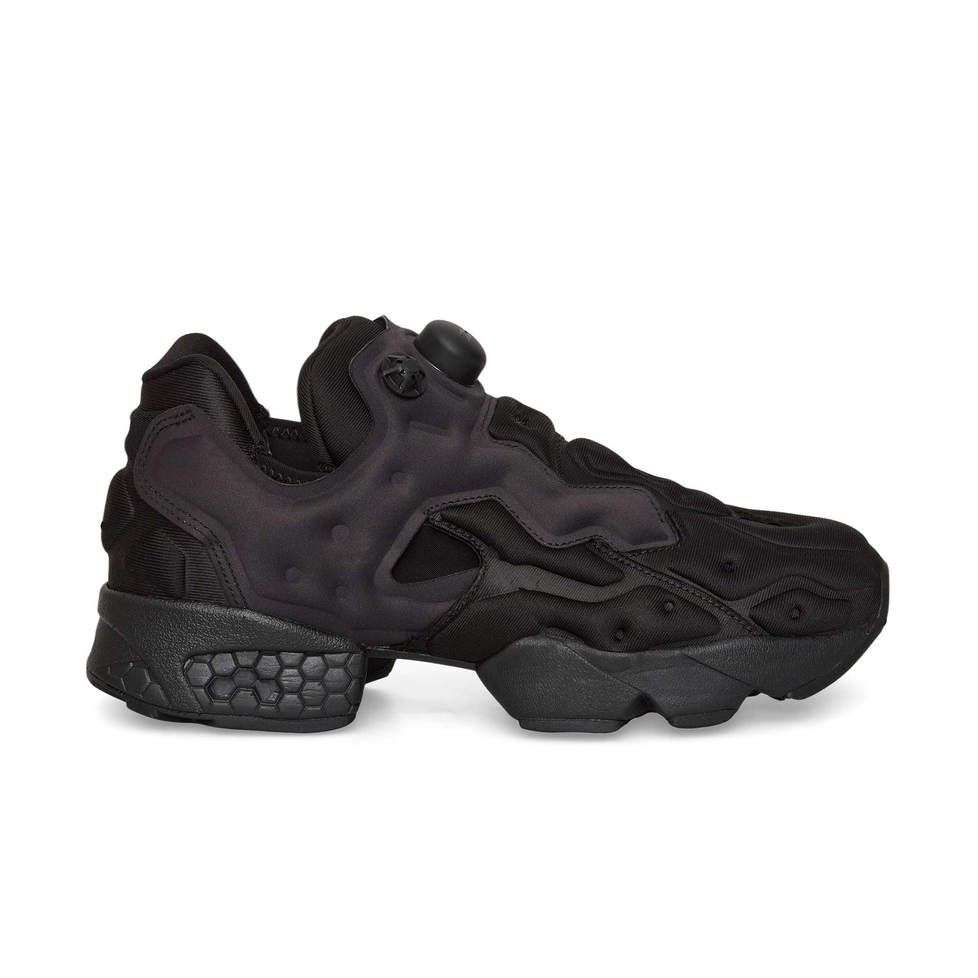 The Reebok Instapump Sliver is a black athletic sneaker featuring a chunky sole, textured accents, and a futuristic design with a visible air pump system on the tongue plus Hexalite heel cushioning for superior comfort.