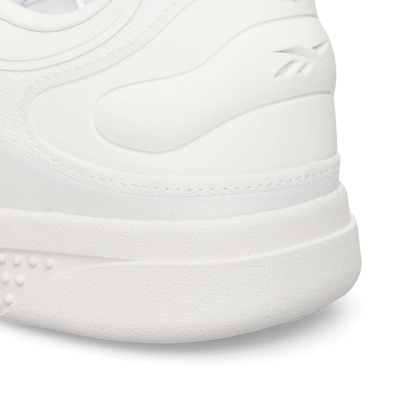 Close-up of the heel and side of the Reebok Hammer Pro Ltd, showing a suede upper with textured details, visible stitching, and an embossed Reebok logo near the ankle.