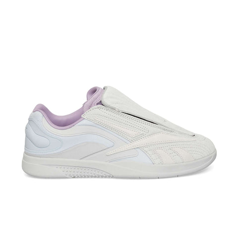 A white and light gray Reebok Hammer Pro Ltd sneaker with a suede upper, lavender lining, sleek design, and subtle textured details, displayed in profile on a plain white background.
